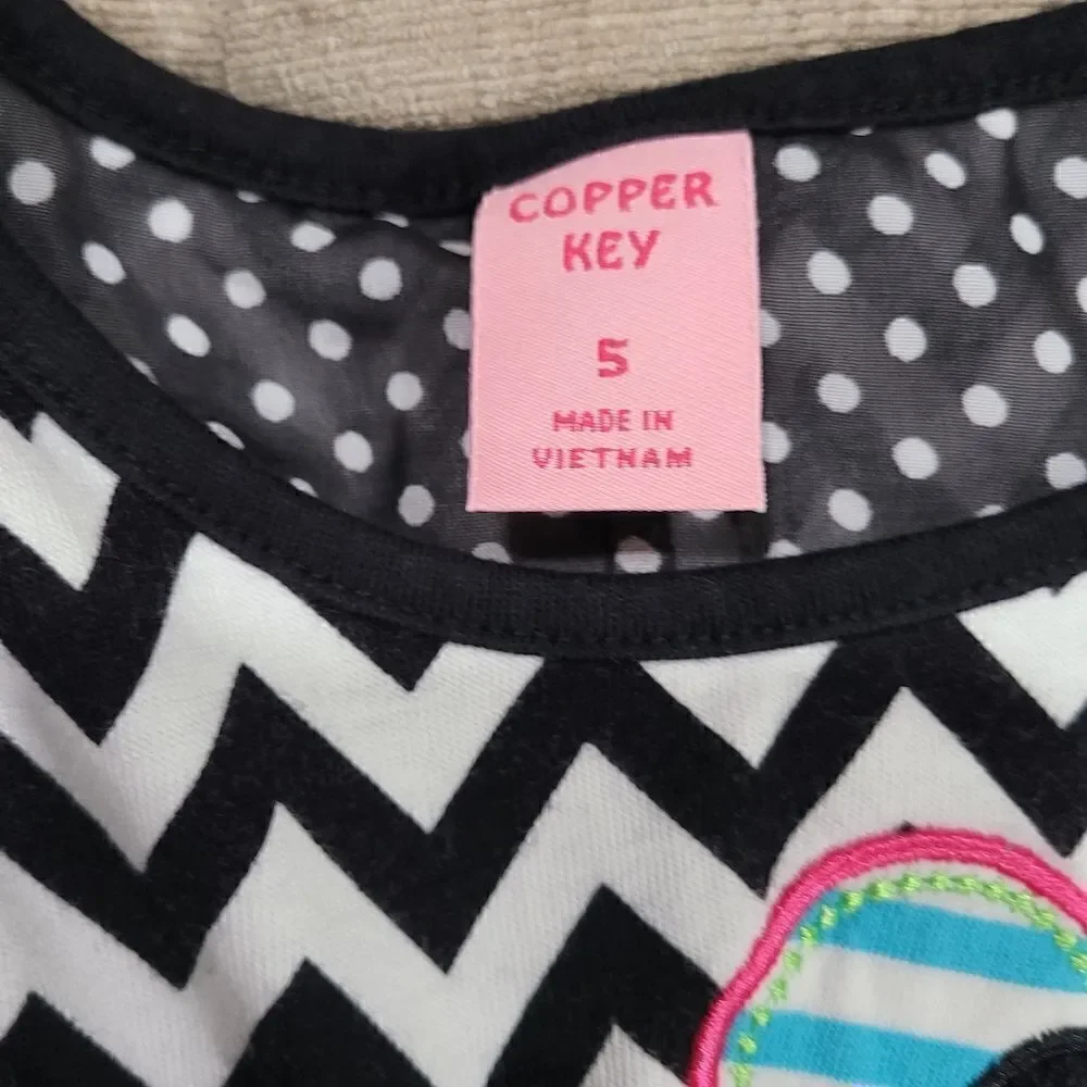 Chevron Dress with flower aplaques